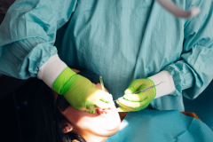 patient-receiving-teeth-cleaning